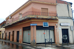 Casa e locale commerciale