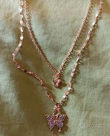 Catenina in acciaio dorato con ciondoli farfalle