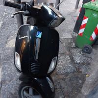 Vespa125s