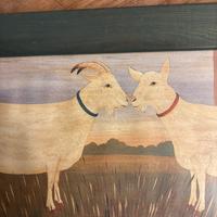 Decorazione:due caprette che si baciano