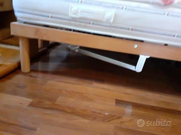 Letto con rete motorizzata e materasso seminuovi