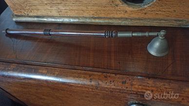 Spegni candela antico