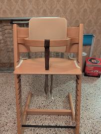 Seggiolino in legno della Stokke