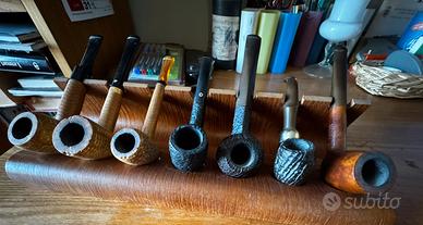 Collezione di pipe con espositore