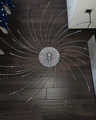 lampadario in acciaio con raggi