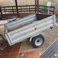 Carrello rimorchio con sponde apribili