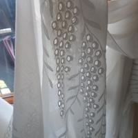 coppia tendoni bianchi ricamati 