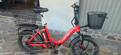 Bici elettrica hitway sbloccata con cestini 