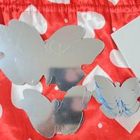 specchi a forma di farfalle