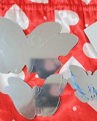 specchi a forma di farfalle