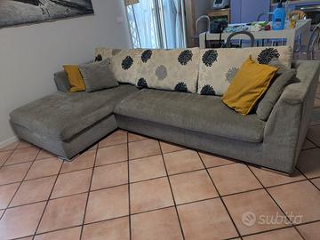 Divano letto con penisola contenitore