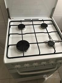 Cucina a metano Rex 4 fuochi con forno elettrico