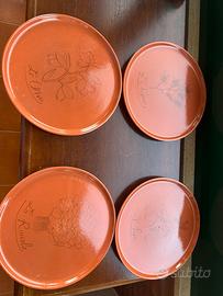 Piatti decorativi  in terracotta smaltata
