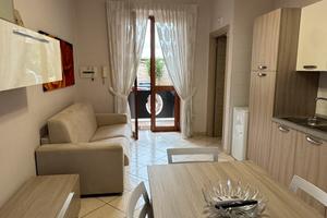 Bilocale arredato con posto auto