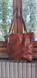 Borsa da donna a secchiello in vero pitone