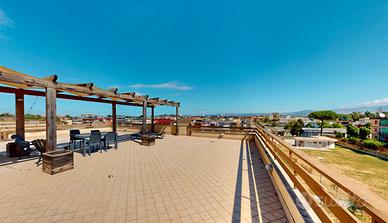 Appartamento con ampio terrazzo e due box auto