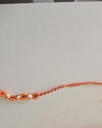 Bracciale cordino arancione con conchiglie estate