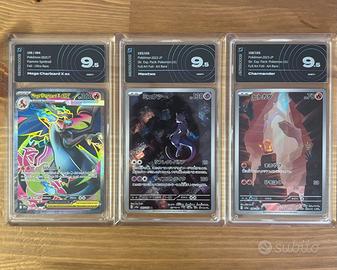 Tre carte Pokemon gradate