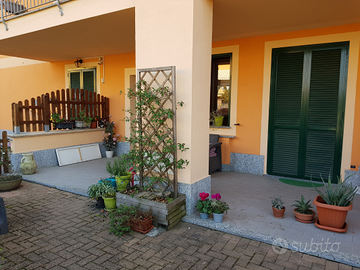 Appartamento con giardino e box auto