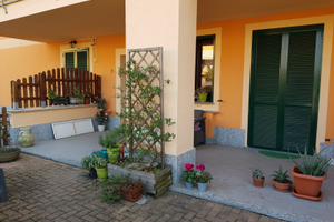 Appartamento con giardino e box auto