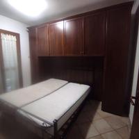 Camera+letto in ferro battuto+rete a doghe