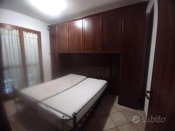 Camera+letto in ferro battuto+rete a doghe