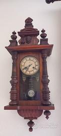 Orologio a pendolo da parete antico in legno