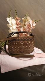 Borsa Coccinelle color verde muschio in pelle 