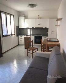 Bilocale con giardino