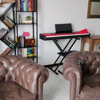 Coppia di poltrone Chesterfield vintage vera pelle