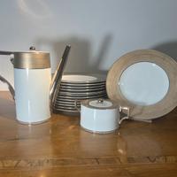 Coffee pot, sugar bowl and 13 dessert plates