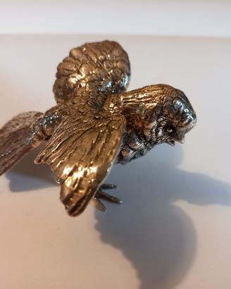 Uccello con ali spiegate in miniatura in argento