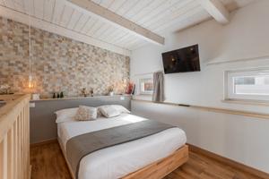 Loft con patio giardino posto auto privato adiacen