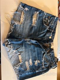 shorts jeans strappatti