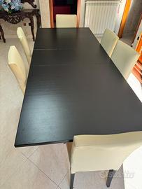 Cucina tavolo armadi e divani