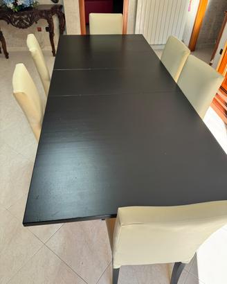 Cucina tavolo armadi e divani