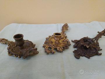 Tre candelieri a bugia in ottone