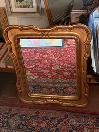 Specchio antico con cornice dorata