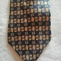 Cravatta vintage YSL pura seta 100%.