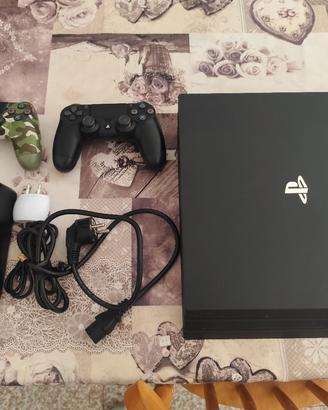 ps4 pro con 2 joystick  e 4 giochi