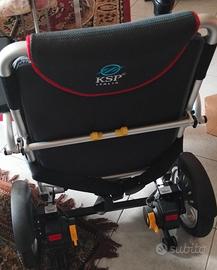 Sedia a rotelle elettrica