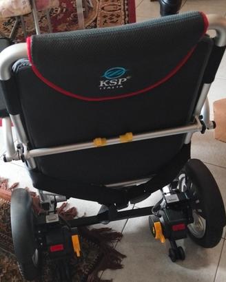 Sedia a rotelle elettrica