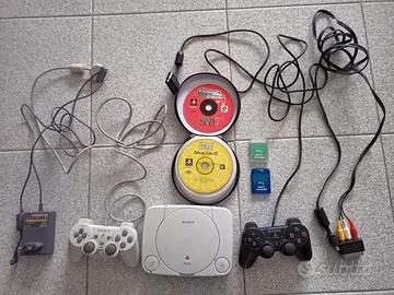 Playstation One + Giochi + 2 joystick + 3 memory