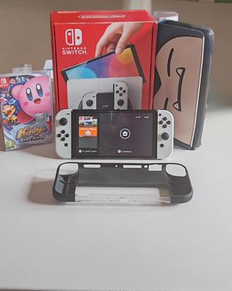 Nintendo Switch Oled + omaggio gioco Kirby