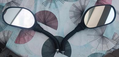 Specchietti universali FAR. 