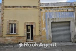 FABBRICATO RESIDENZIALE A RUSTICO IN CORSO DI COMP