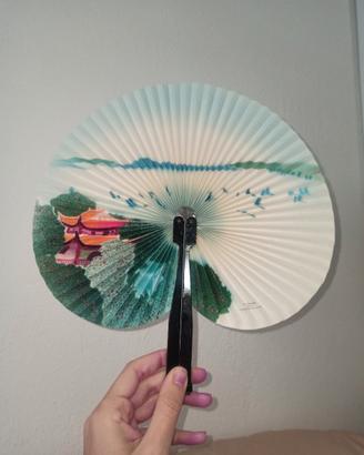 Ventaglio circolare vintage in carta casa e alberi