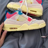 Jordan 4 retrò rosa taglia 45