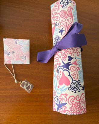 Poster e ciondolo Valentino beauty