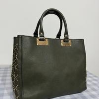 Borsa donna ecopelle verde con borchie oro